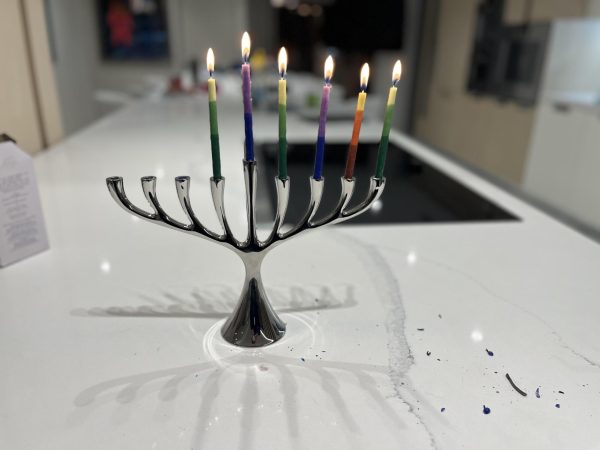 A LIT menorah burns through the fifth night of Hanukkah, representing the Macabee's escape from oppression.