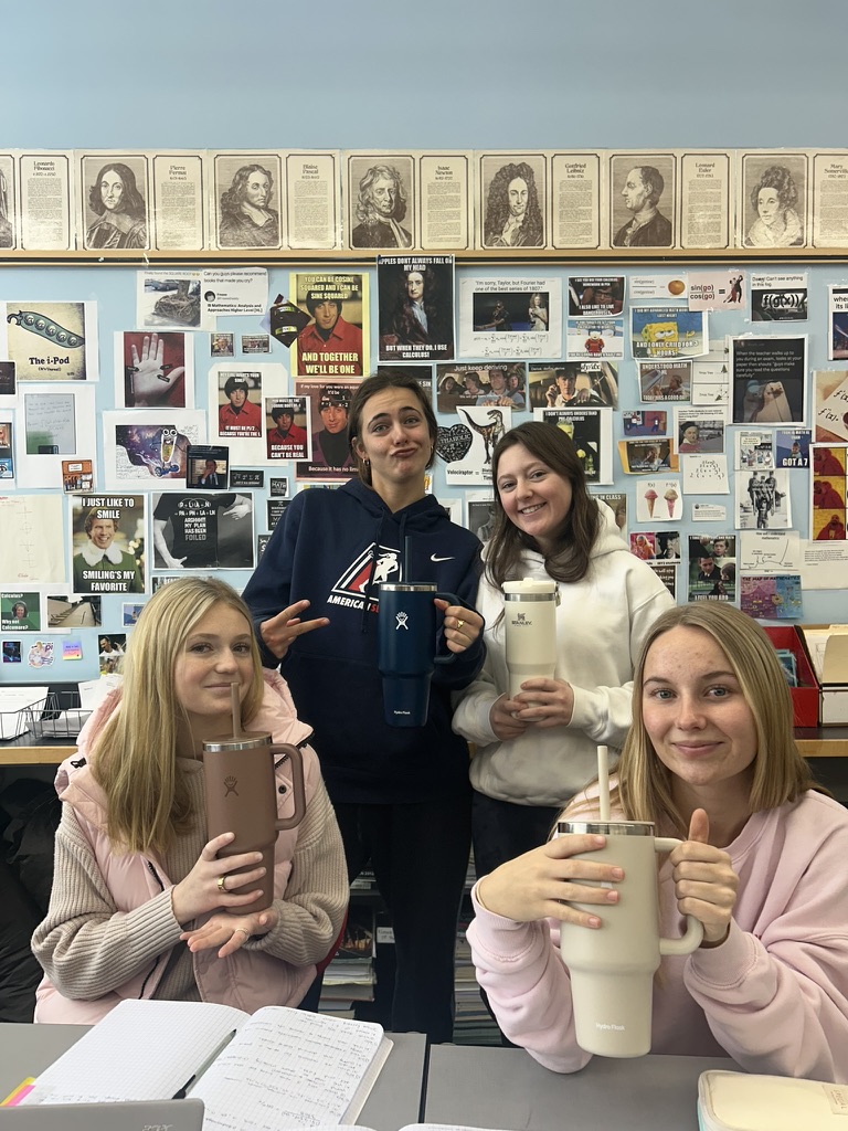 AHS senior girls pose with their water flasks, following in the footsteps of microtrends.