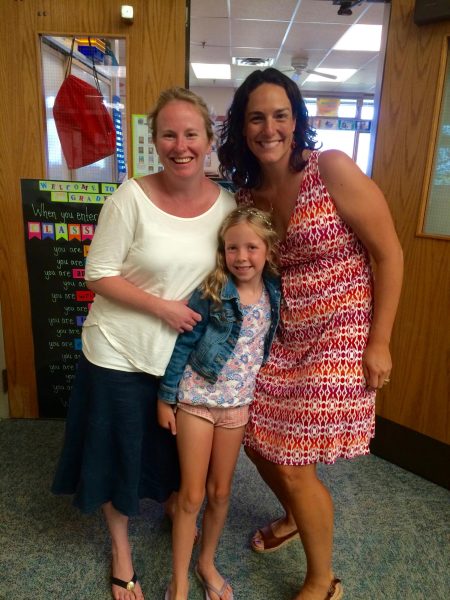 Becky Oliver poses with Eleanor Carroll and Renee Giles on the first day of 2nd grade in 2015.