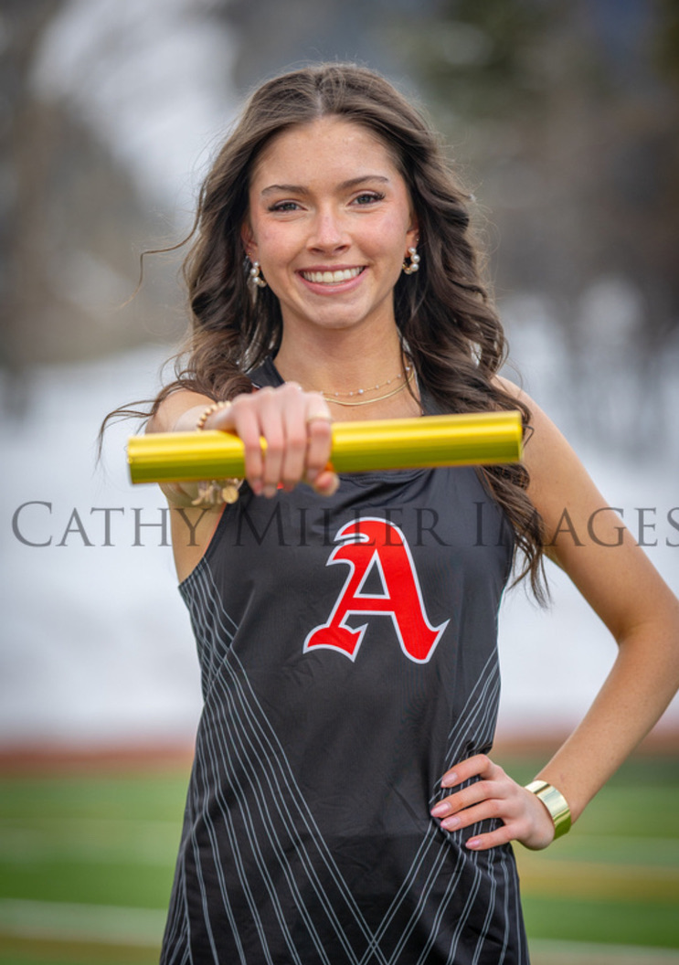 Araya Thompson poses for her senior photo prior to track season.