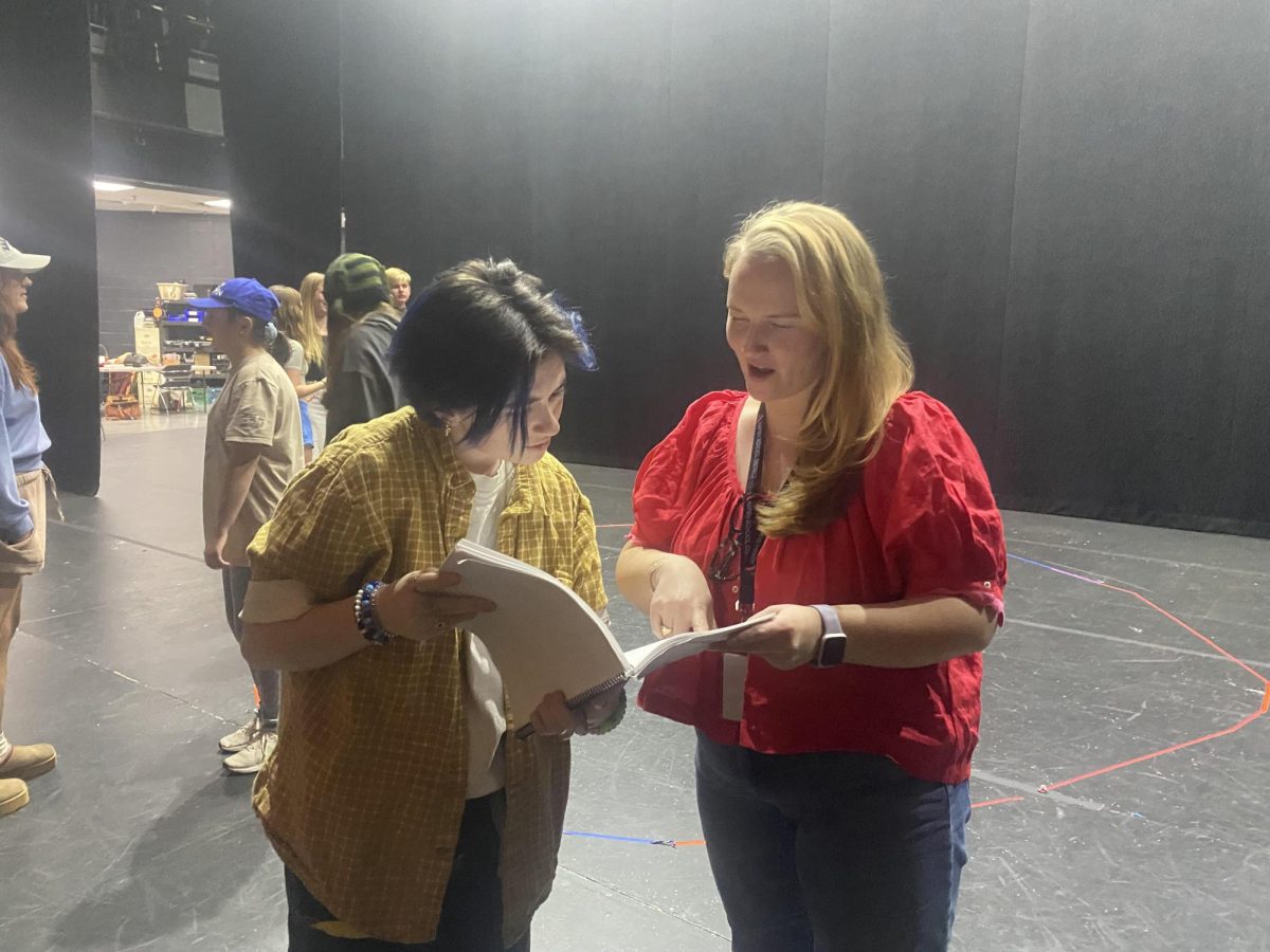 Jacob Owsley (left) works on scene analysis with Bye Bye Birdie director, Caitlin Cremins (right). Bye Bye Birdie opens Thursday, November 13, and runs through the weekend.