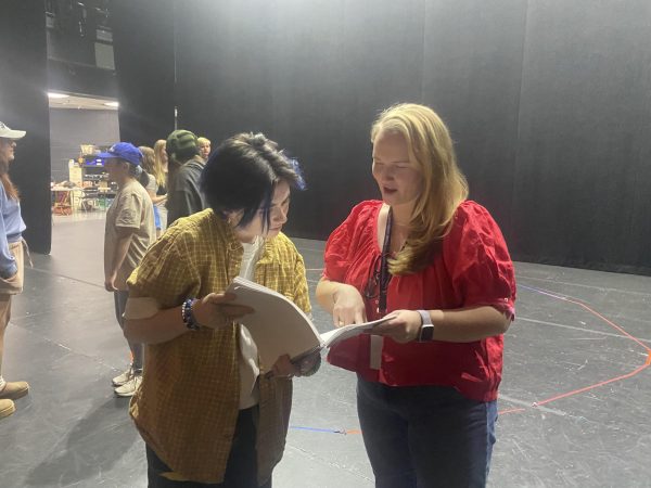 Jacob Owsley (left) works on scene analysis with Bye Bye Birdie director, Caitlin Cremins (right). Bye Bye Birdie opens Thursday, November 13, and runs through the weekend.