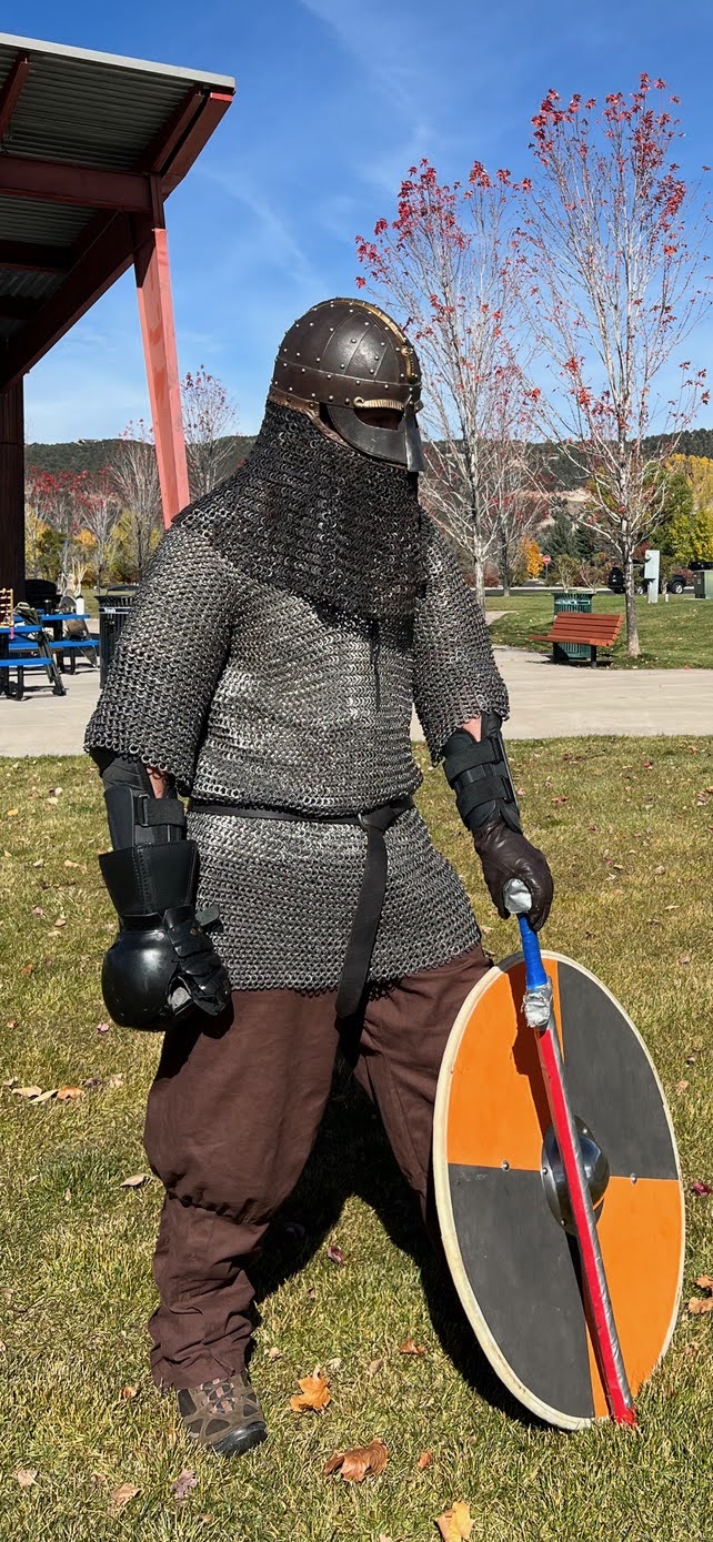 Scott Reed stands in his battle gear at the Crown Mountain Park. 