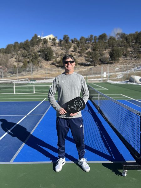 Steve Sand stands on the pickle ball court ready to play. 