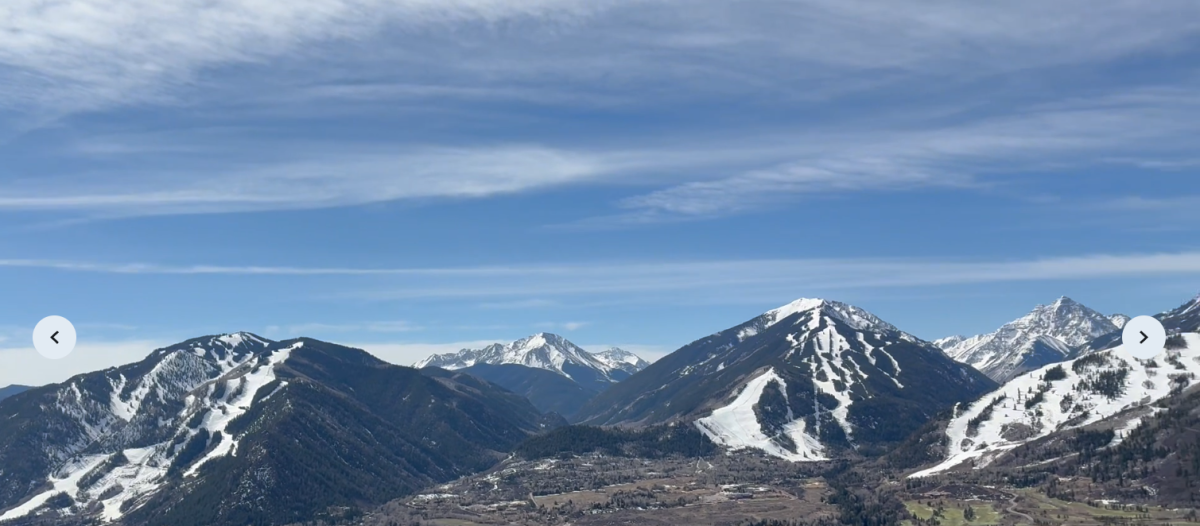 3 of the 4 Aspen-Snowmass Ski resorts are shown going into the spring part of the ski season, with the Maroon Bells in the background.